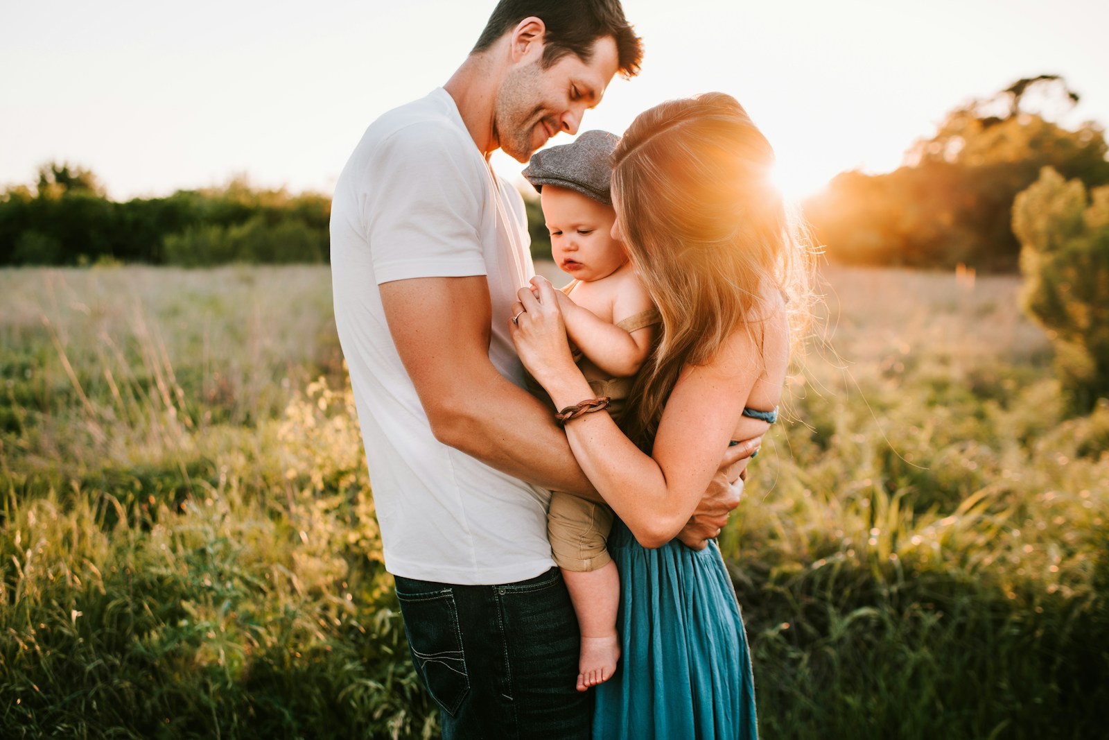A family spending a sunny afternoon together in a field